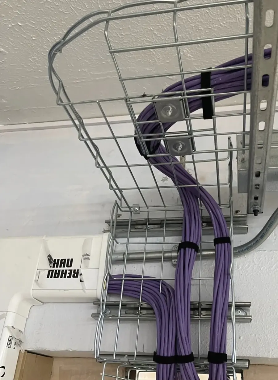 Cat6A first fix: cable drop to trunking